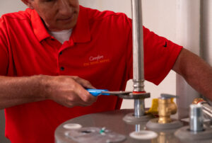 HVAC technician installing a boiler in Minneapolis, MN