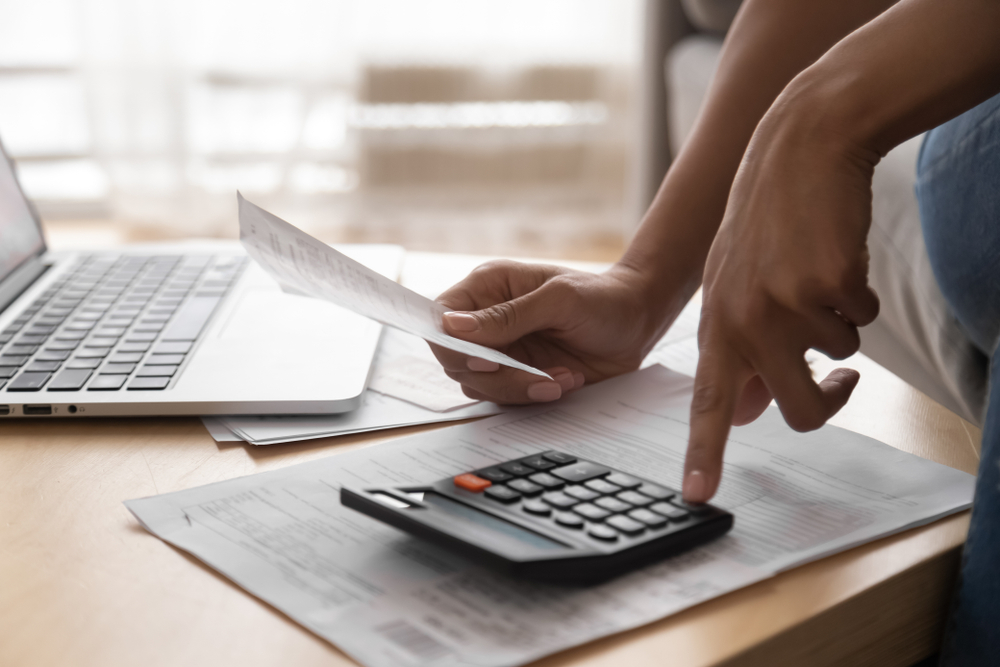 Woman paying utility bill